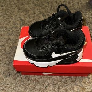 Kids Nike black sneakers